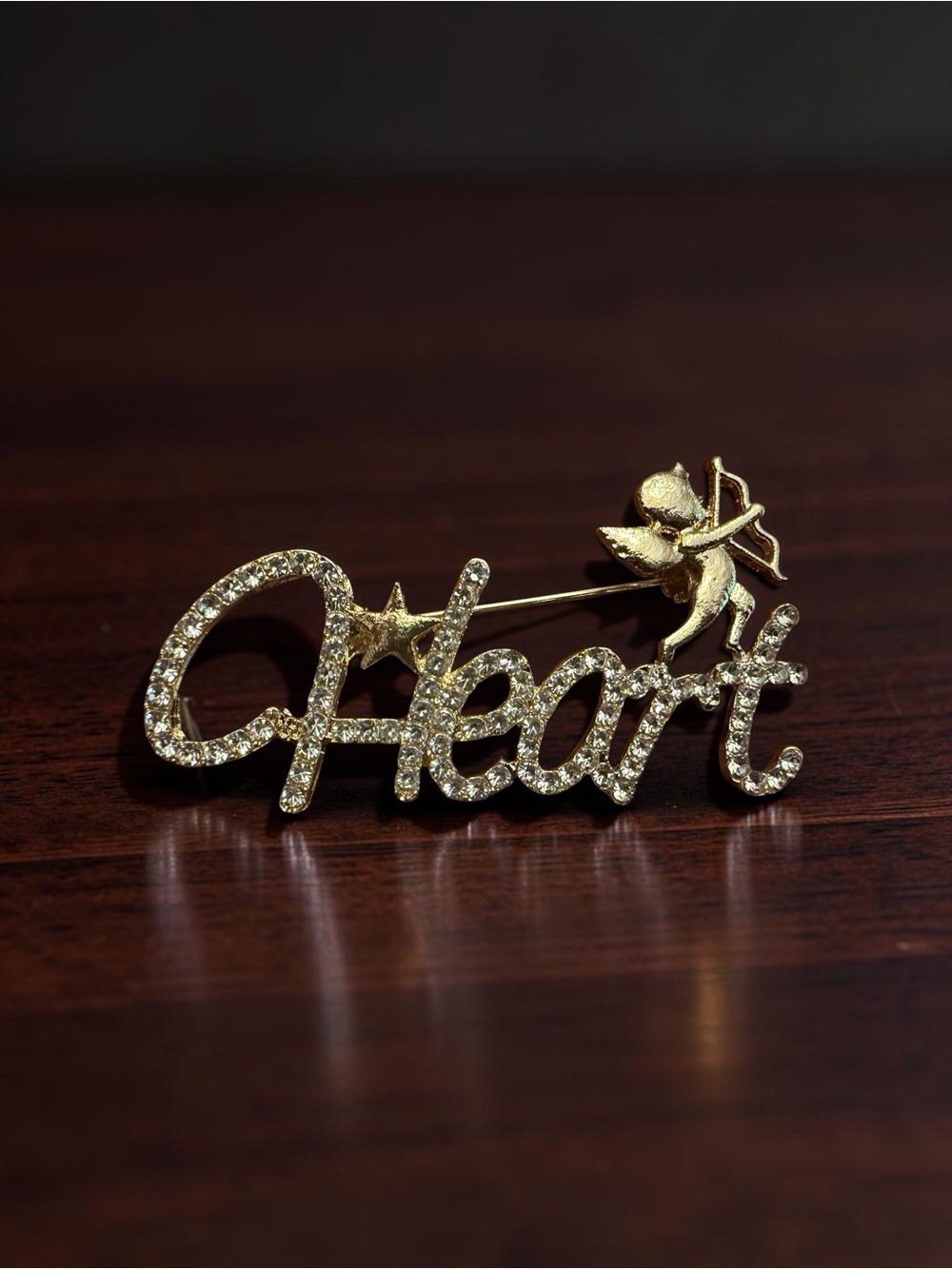 Gold 'Heart' Script Brooch with Cupid Accent